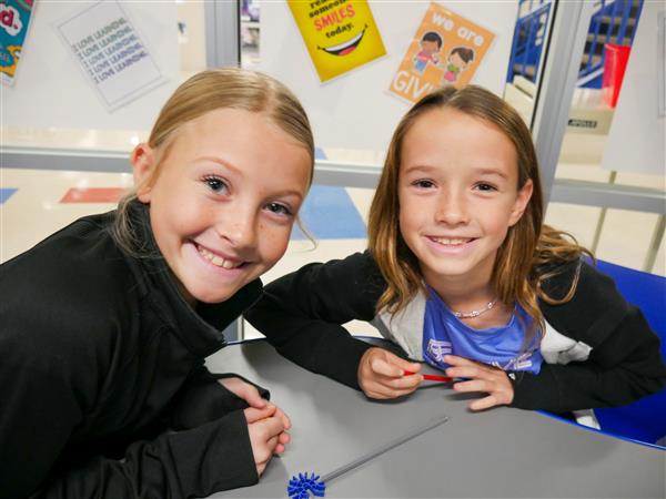 Students learning and having fun in Library.